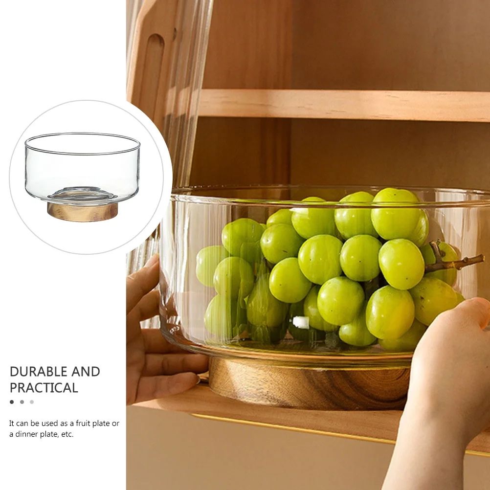 Glass fruit bowl with a wooden base